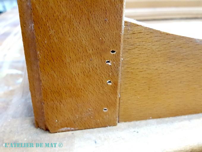 Solidification d'un pied de table au cloueur pneumatique